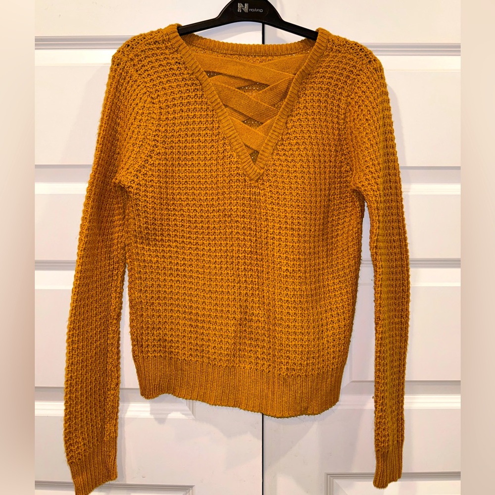 Yellow knitted sweater